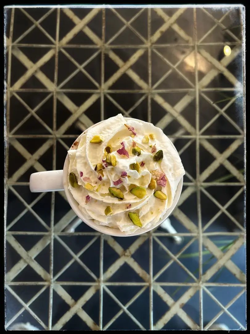 Whipped cream pistachio coffee.